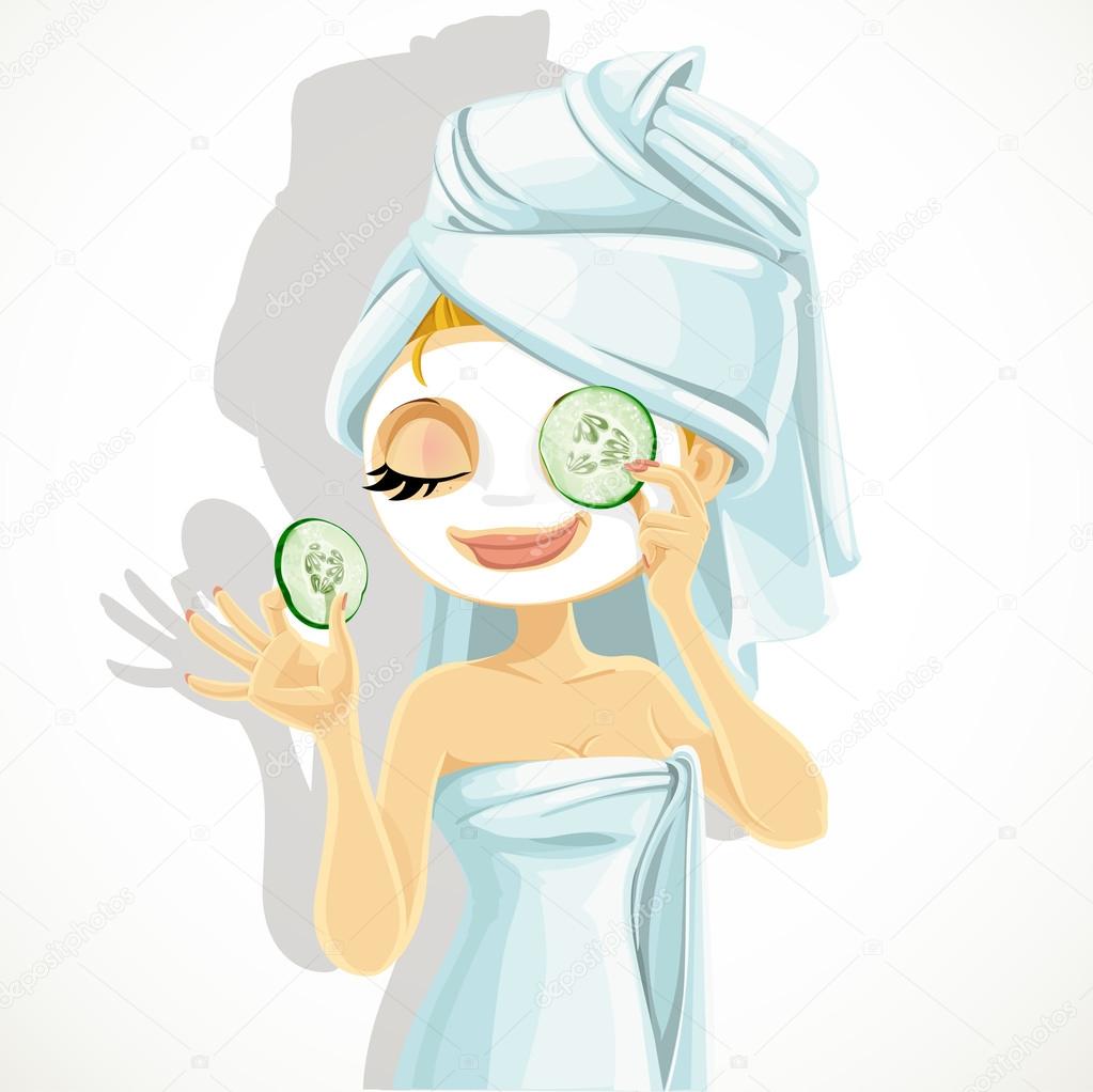 Cute girl in a cosmetic mask pack puts cucumbers on eyes
