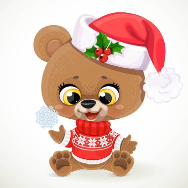 Noel süveteri ve Noel Baba kırmızı şapkalı şirin oyuncak ayı beyaz arka planda oturur ve kar tanesiyle oynar.