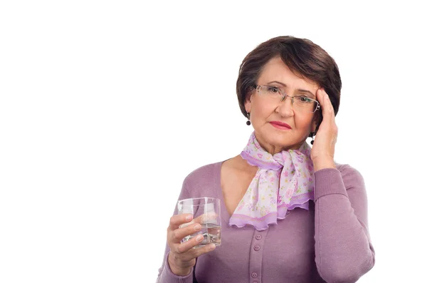 Senior woman with headache — Stock Photo, Image