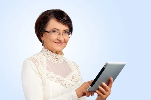 Portrait of senior woman with digital tablet — Stock Photo, Image