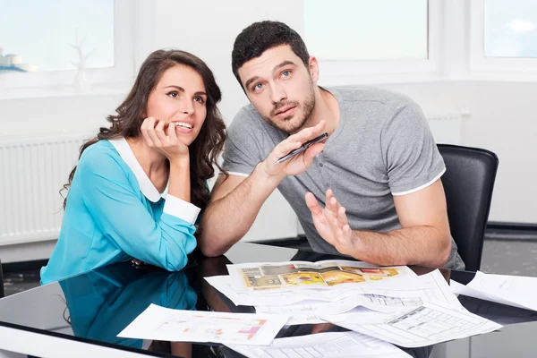 Couple is considering future apartment design — Stock Photo, Image