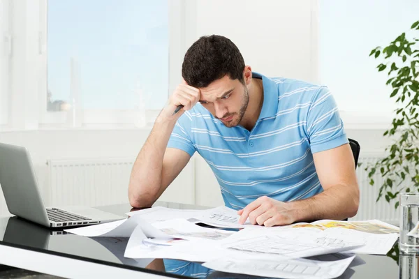 Handsome young interior designer at workplace — Stock Photo, Image