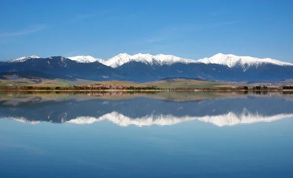 Reflection of snowy Rohace mountains — Stock Photo, Image