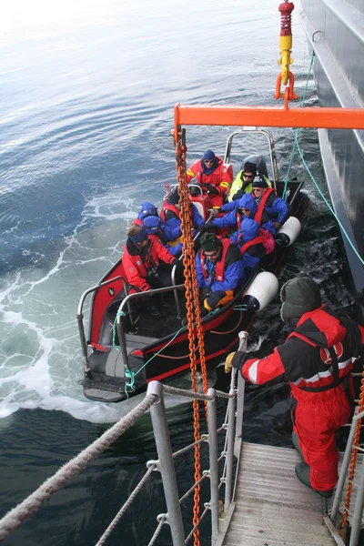 Polar landing boat returning tourists to cruise ship