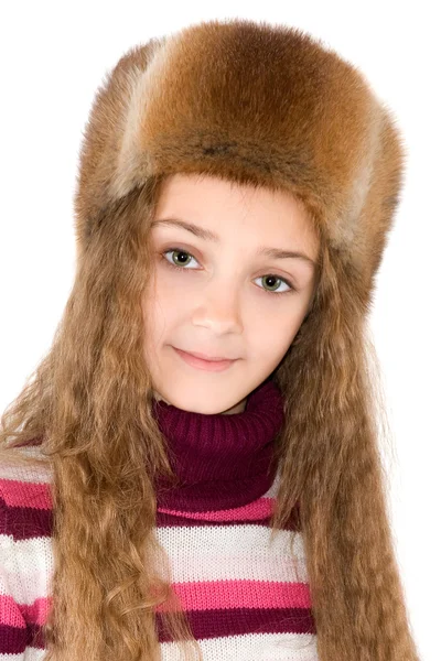 The girl in a winter fur-cap — Stock Photo, Image