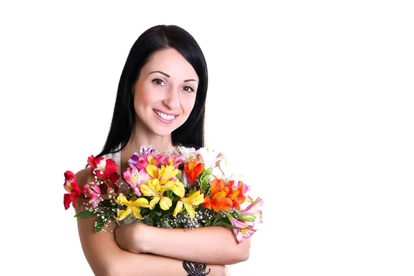 Feliz joven mujer abrazando flores —  Fotos de Stock