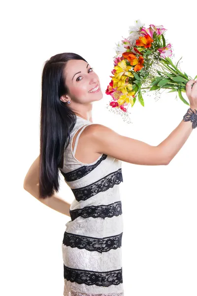 Mulher bonita com um buquê de flores coloridas — Fotografia de Stock