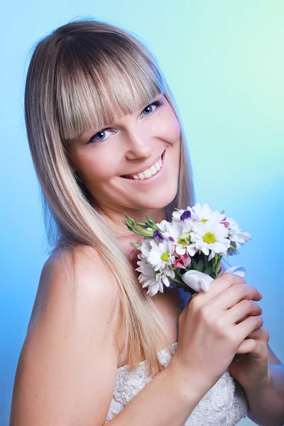 Portrait of happy bride with a bouquet — Stock Photo, Image