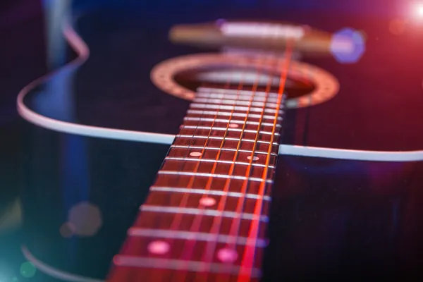 Guitar in the spotlight — Stock Photo, Image
