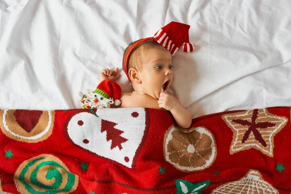 Little Surprised Newborn Baby Wearing Santa Hat Lies Red Christmas — Stock Photo, Image