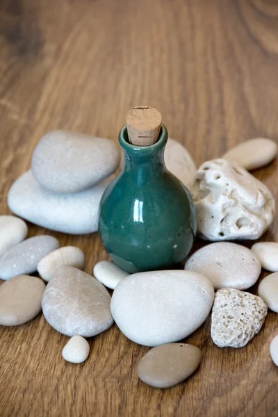 Bottle and Stones — Stock Photo, Image