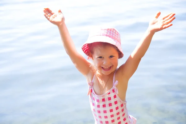 Happy girl near water — Stock Photo, Image