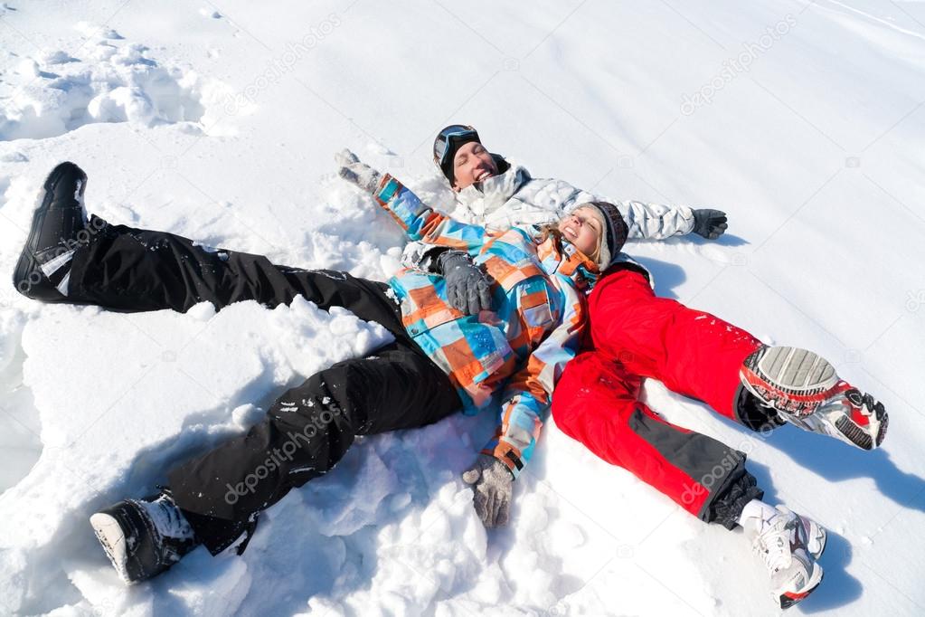 Couple play in snow