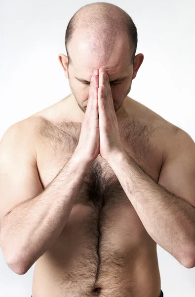 Hombre en posición de oración — Foto de Stock