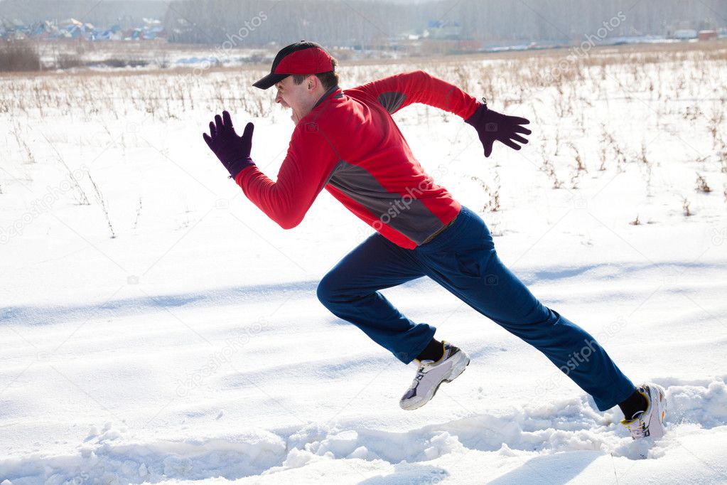 Jogging in winter — Stock Photo © yanlev 16893975
