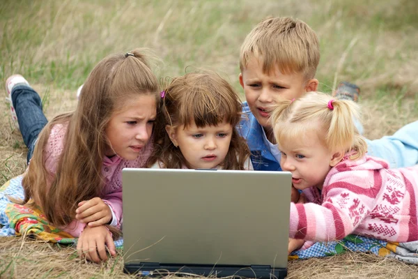 Schoolchild at the laptop — Stock Photo, Image