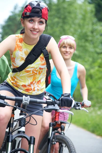 Two young girls on bicycle — Stock Photo, Image