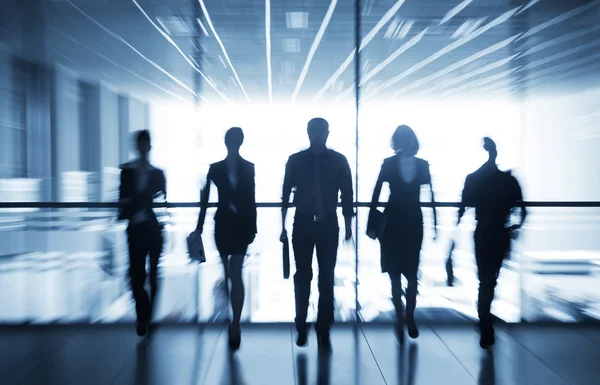 Silhouettes of businesspeople — Stock Photo, Image