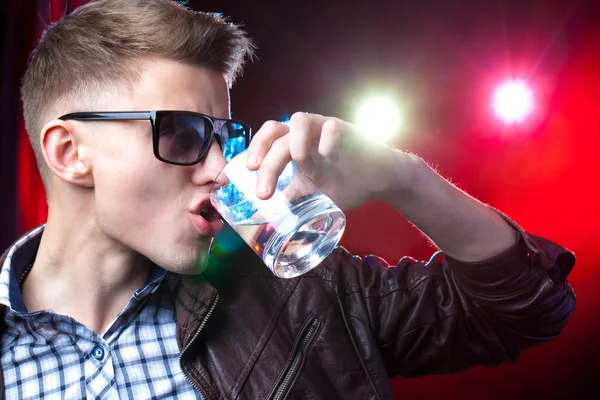 Young boy with alcohol — Stock Photo, Image