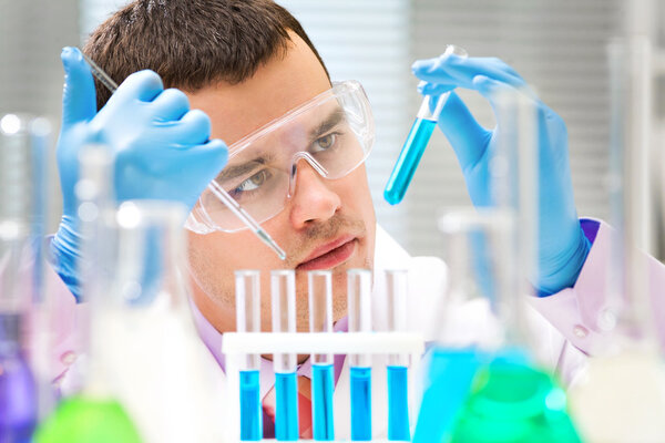 Researcher working with chemicals