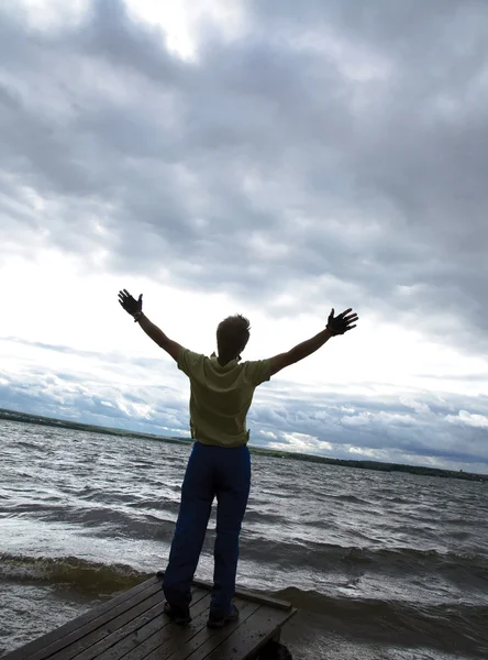 Man over  cloudy  sky — Stock Photo, Image