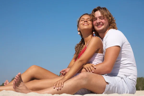 Couple at the beach Stock Photo