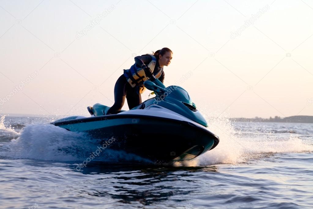 Girl riding jet ski