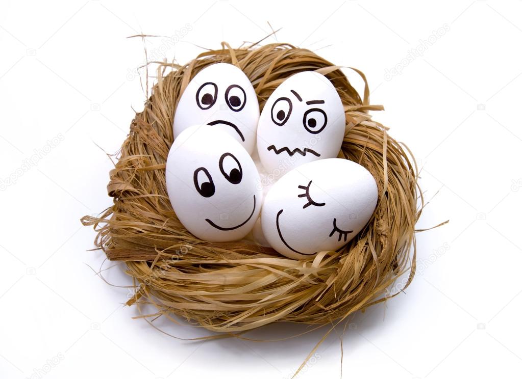 Easter funny eggs in nest