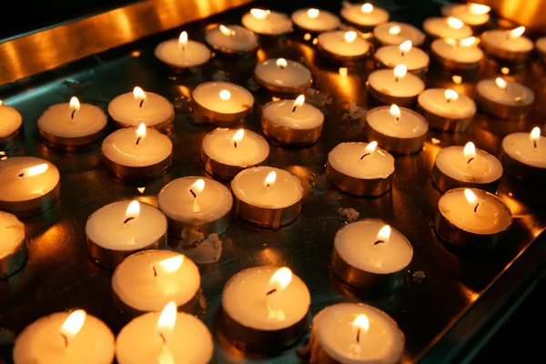 Tante piccole candele — Foto Stock