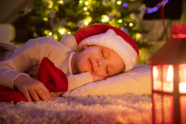 Little Girl Santa Hat Fell Asleep Home Christmas — Stock Photo, Image