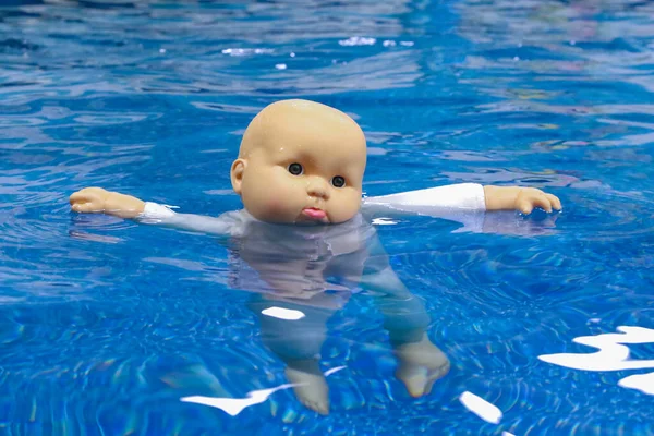 Doll Baby Drowns Blue Water — Stock Photo, Image