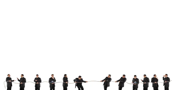 Team Competing Tug War While Some Strive Duty Others Inattentive — Stock Photo, Image