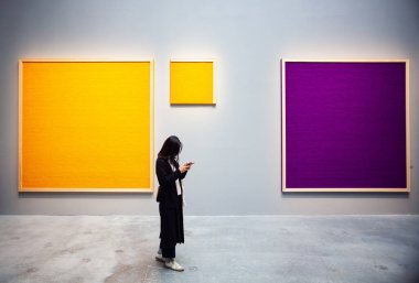 VENICE, ITALY - April 20: Artworks by Rosemarie Trockel titled Wool yellow and purple on canvas at 59th Venice biennale on April 20, 2022