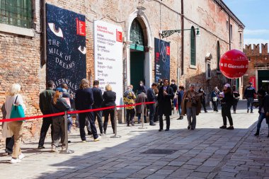 Venice, Italy - April 20: Visitors before the Entrance of the Arsenale during the 59th International Art exhibition of Venice biennale titled The Milk of dreams on April 20, 2022 clipart