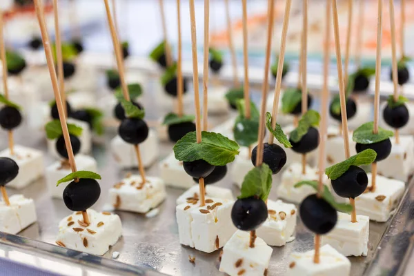 Preparation Delicious Appetizers Soft Goat Cheese Olives Mint Leaves Party — Stok fotoğraf