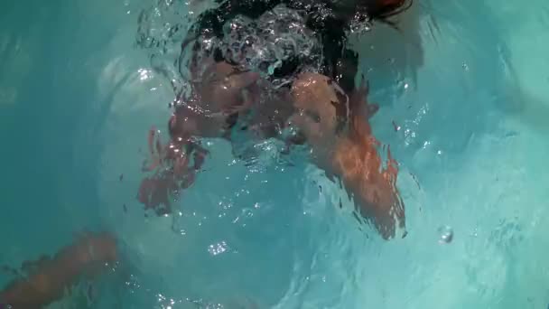 Happy Little Girl Has Fun Swimming Underwater Pool — Stockvideo