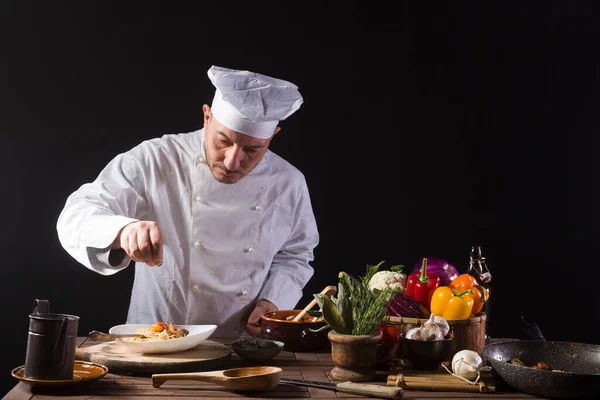 Male Cook White Uniform Hat Putting Pot Herbs Food Plate —  Fotos de Stock