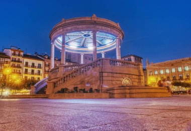 Night view of the square called Plaza del Castillo with the typical kiosk illuminated, Pamplona Navarra Spain