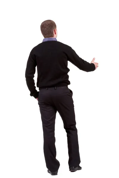 手を振るにアウトに達するビジネスマンの背面図 — ストック写真