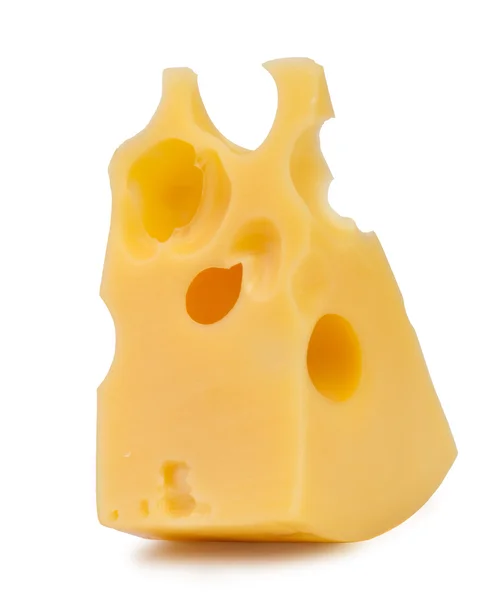 Trozo de queso. una rebanada de queso con agujeros triangular — Foto de Stock