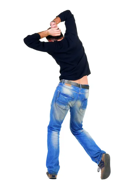 Dancing young man back view. — Stock Photo, Image