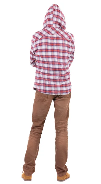 Bakifrån av kille i en rutig skjorta med huva — Stockfoto