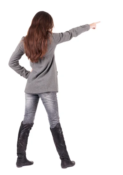 Vista posteriore della donna che punta . — Foto Stock