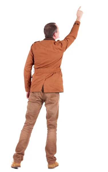 Back view of man in jacket pointing. — Stock Photo, Image