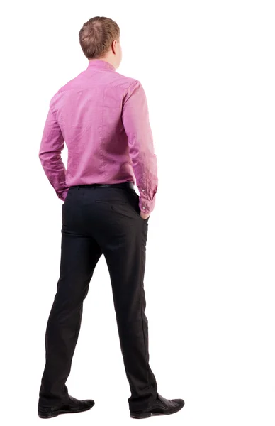 Back view of business man in red shirt looks ahead. — Stock Photo, Image