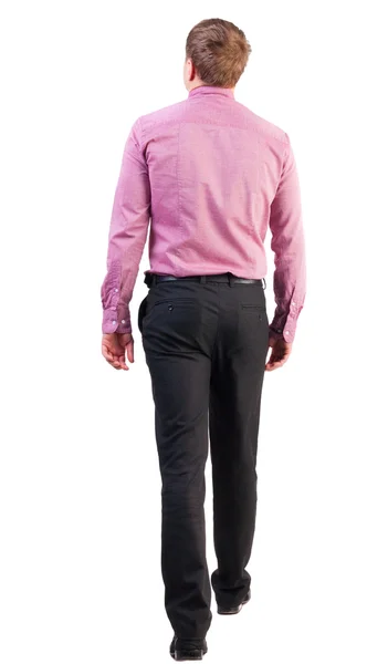Back view of going handsome business man in pink shirt — Stock Photo, Image