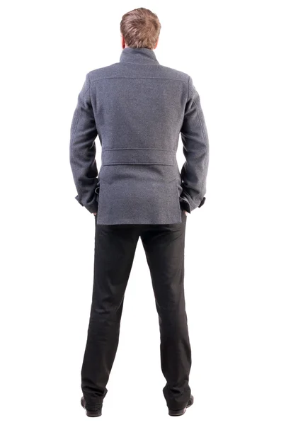 Vista posterior de hombre de negocios atractivo en capa — Foto de Stock
