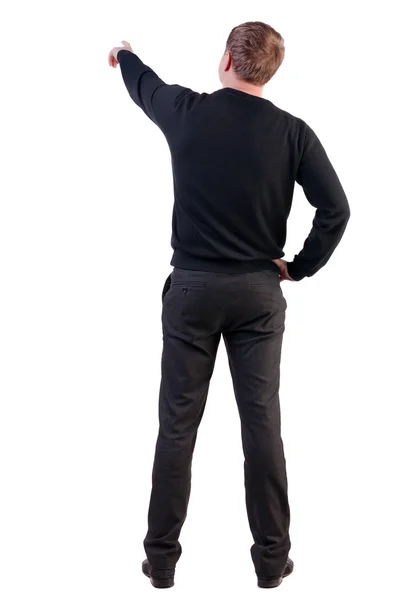 Back view of pointing young business men in sweater — Stock Photo, Image