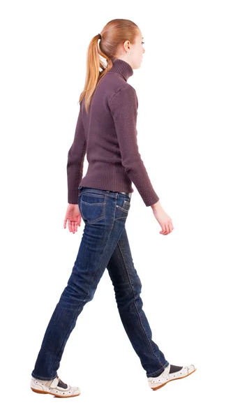 Vissza view sétáló nő-ban pulóver — Stock Fotó