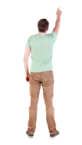 Back view of pointing young men in shirt and jeans. — Stock Photo, Image